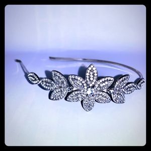 Bands 2 for $10. Metal silver rhinestone headband.
